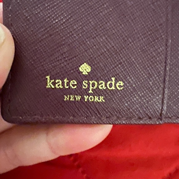 Kate Spade Burgundy/Wine Bifold Wallet with Gold Tone Accents. - Picture 6 of 9